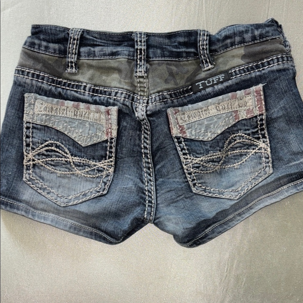 Cowgirl Tuff Blue Jean Shorts with Frayed Hem and Decorative Stitching